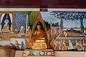 Chiang Mai - Wat Phra That Doi Suthep. The walls of the gallery are covered with Buddha statues and mural paintings of Jataka and tales of the previous lives of the Buddha.